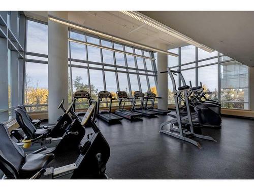 1006-77 Spruce Place Sw, Calgary, AB - Indoor Photo Showing Gym Room