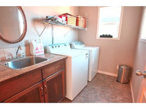 118 Everglen Crescent Sw, Calgary, AB - Indoor Photo Showing Laundry Room