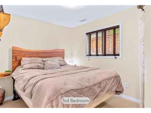 2-614 3Rd Street, Canmore, AB - Indoor Photo Showing Bedroom