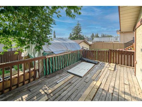 103 Sandstone Way Nw, Calgary, AB - Outdoor With Deck Patio Veranda With Exterior