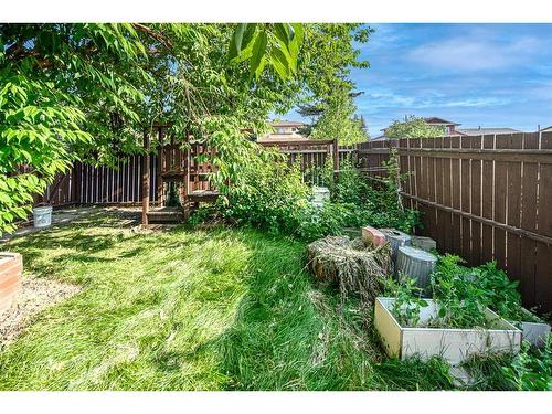 103 Sandstone Way Nw, Calgary, AB - Outdoor