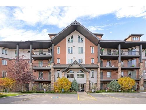 2110-15 Sunset Square, Cochrane, AB - Outdoor With Facade