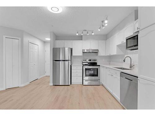 103-7 Somervale View Sw, Calgary, AB - Indoor Photo Showing Kitchen With Stainless Steel Kitchen With Upgraded Kitchen