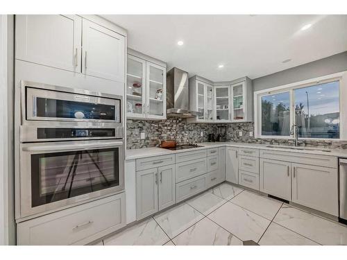 808 Luxstone Square Sw, Airdrie, AB - Indoor Photo Showing Kitchen With Upgraded Kitchen