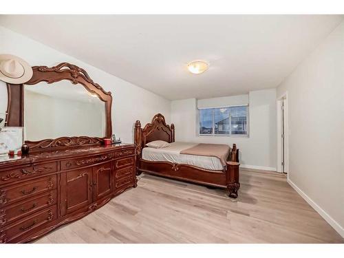 808 Luxstone Square Sw, Airdrie, AB - Indoor Photo Showing Bedroom