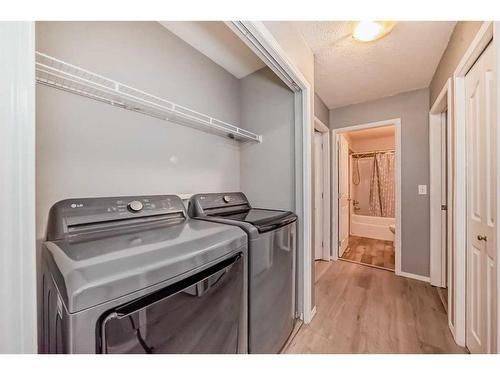 808 Luxstone Square Sw, Airdrie, AB - Indoor Photo Showing Laundry Room