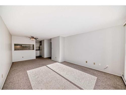 516-9800 Horton Road Sw, Calgary, AB - Indoor Photo Showing Other Room