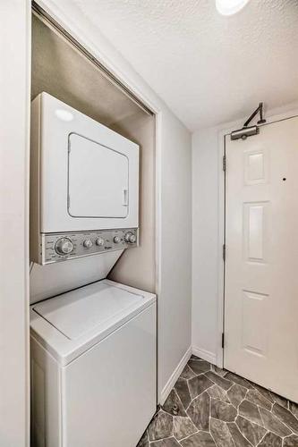 516-9800 Horton Road Sw, Calgary, AB - Indoor Photo Showing Laundry Room