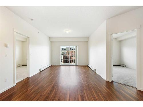 1416-99 Copperstone Park Se, Calgary, AB - Indoor Photo Showing Living Room