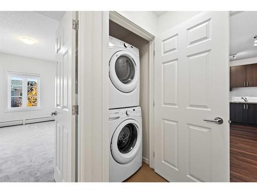 1416-99 Copperstone Park Se, Calgary, AB - Indoor Photo Showing Laundry Room