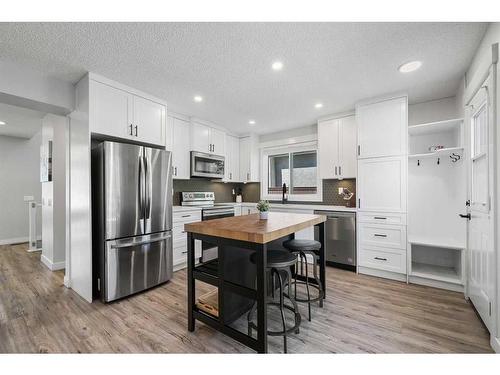 108 Cantrell Drive Sw, Calgary, AB - Indoor Photo Showing Kitchen With Stainless Steel Kitchen