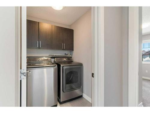 118 Evansmeade Crescent Nw, Calgary, AB - Indoor Photo Showing Laundry Room