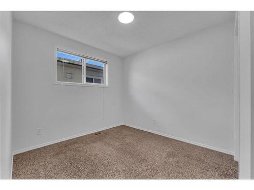 23 Falshire Close Ne, Calgary, AB - Indoor Photo Showing Other Room