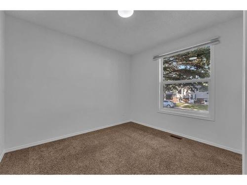 23 Falshire Close Ne, Calgary, AB - Indoor Photo Showing Other Room