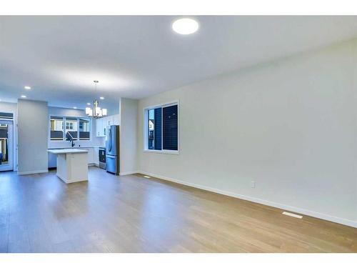 115 Dawson Wharf Rise, Chestermere, AB - Indoor Photo Showing Living Room