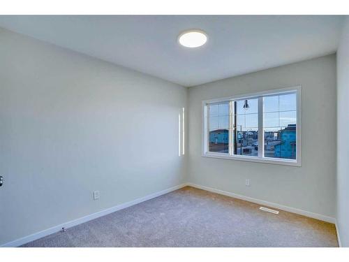 115 Dawson Wharf Rise, Chestermere, AB - Indoor Photo Showing Other Room