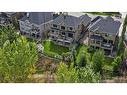 100 Cranbrook Heights Se, Calgary, AB  - Outdoor 