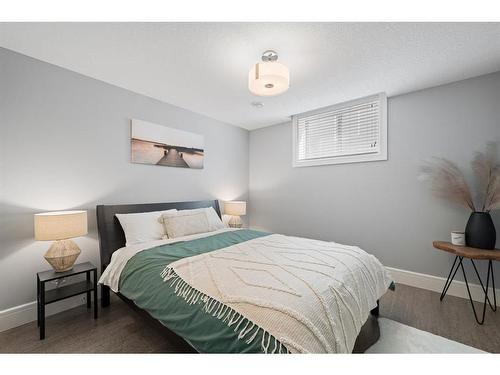 100 Cranbrook Heights Se, Calgary, AB - Indoor Photo Showing Bedroom