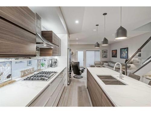 2-2605 15 Street Sw, Calgary, AB - Indoor Photo Showing Kitchen With Double Sink With Upgraded Kitchen