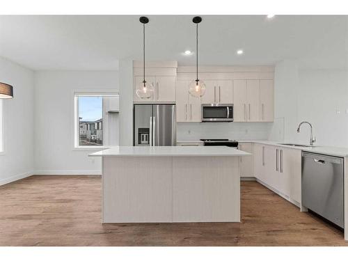 706-280 Chelsea Road, Chestermere, AB - Indoor Photo Showing Kitchen With Stainless Steel Kitchen With Upgraded Kitchen