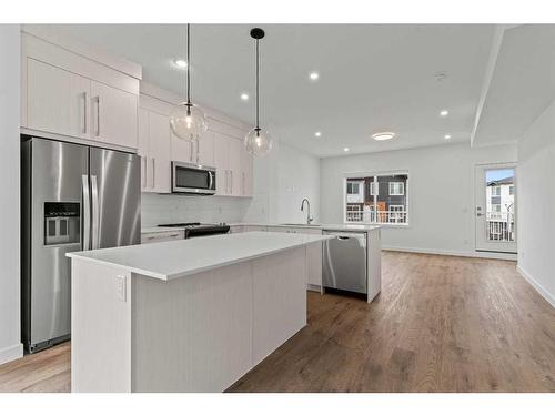 706-280 Chelsea Road, Chestermere, AB - Indoor Photo Showing Kitchen With Stainless Steel Kitchen With Upgraded Kitchen