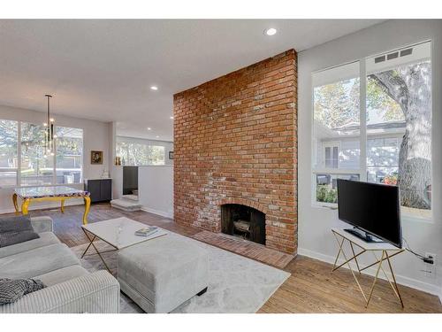 82 Massey Place Sw, Calgary, AB - Indoor Photo Showing Living Room With Fireplace