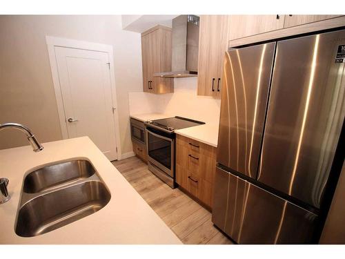 320-400 Auburn Meadows Common Se, Calgary, AB - Indoor Photo Showing Kitchen With Double Sink