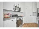 305 Ambleton Drive Nw, Calgary, AB  - Indoor Photo Showing Kitchen With Upgraded Kitchen 