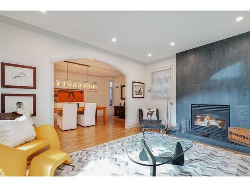 2121 2 Avenue Nw, Calgary, AB - Indoor Photo Showing Living Room With Fireplace