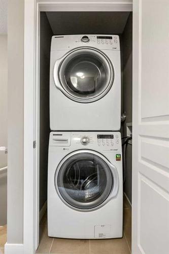 949 Mckenzie Towne Manor Se, Calgary, AB - Indoor Photo Showing Laundry Room