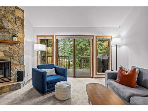 13 Riverview Place, Canmore, AB - Indoor Photo Showing Living Room With Fireplace