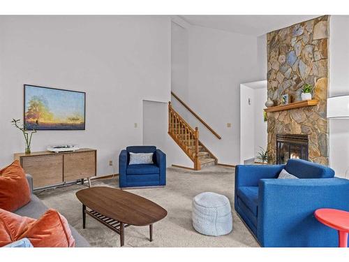 13 Riverview Place, Canmore, AB - Indoor Photo Showing Living Room With Fireplace