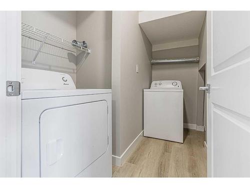 206 Lucas Close Nw, Calgary, AB - Indoor Photo Showing Laundry Room