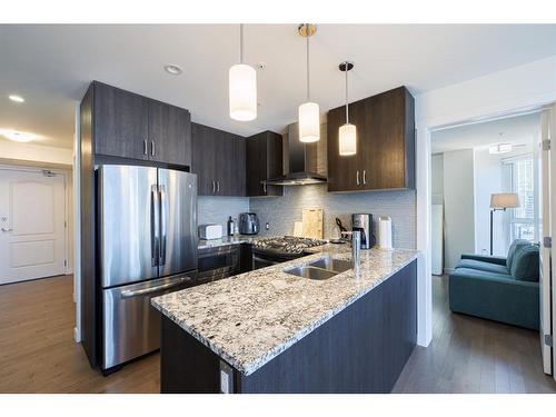 1504-303 13 Avenue Sw, Calgary, AB - Indoor Photo Showing Kitchen With Stainless Steel Kitchen With Double Sink With Upgraded Kitchen