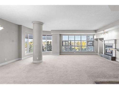 401-110 7 Street Sw, Calgary, AB - Indoor With Fireplace