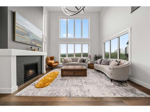 216 Discovery Drive Sw, Calgary, AB - Indoor Photo Showing Living Room With Fireplace