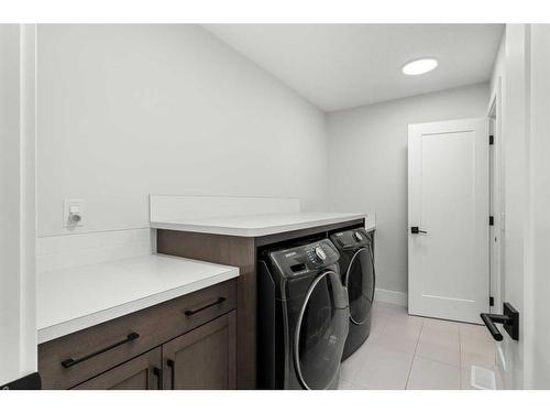 216 Discovery Drive Sw, Calgary, AB - Indoor Photo Showing Laundry Room