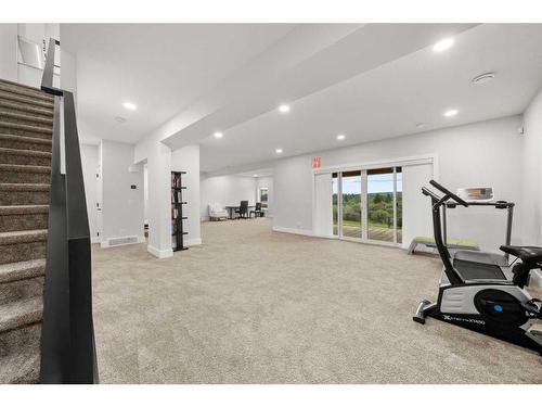 216 Discovery Drive Sw, Calgary, AB - Indoor Photo Showing Gym Room