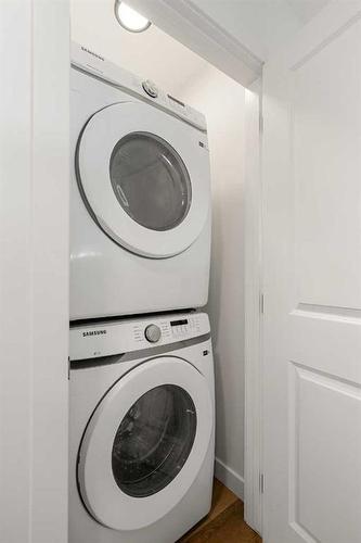 #601-550 Seton Circle Se, Calgary, AB - Indoor Photo Showing Laundry Room