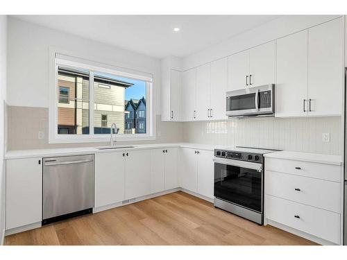 #601-550 Seton Circle Se, Calgary, AB - Indoor Photo Showing Kitchen