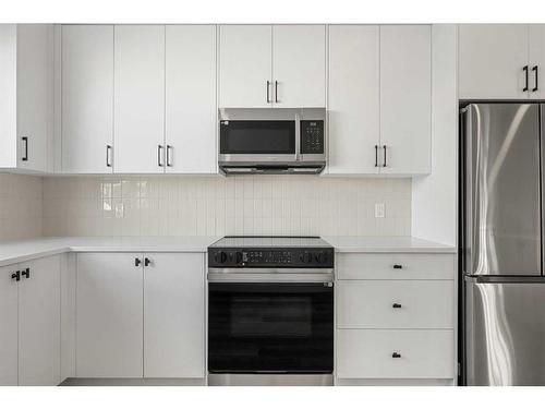 #601-550 Seton Circle Se, Calgary, AB - Indoor Photo Showing Kitchen