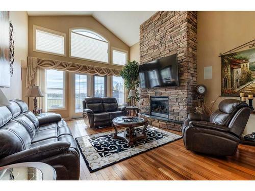 63059A Township Road 382, Rural Clearwater County, AB - Indoor Photo Showing Living Room With Fireplace