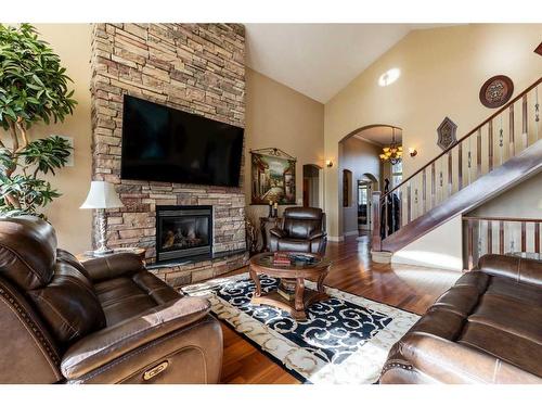 63059A Township Road 382, Rural Clearwater County, AB - Indoor Photo Showing Living Room With Fireplace