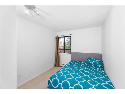 312-1919 36 Street Sw, Calgary, AB - Indoor Photo Showing Bedroom