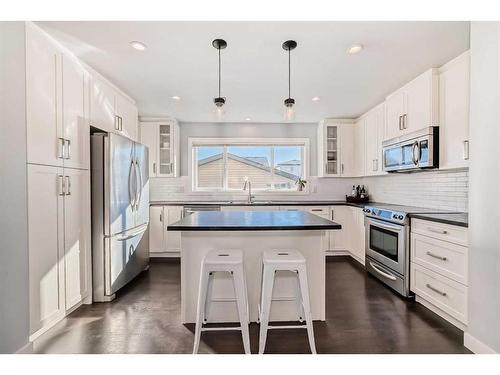 2120 Reunion Square Nw, Airdrie, AB - Indoor Photo Showing Kitchen With Upgraded Kitchen