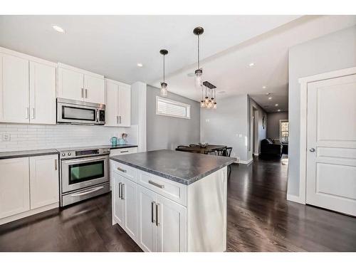 2120 Reunion Square Nw, Airdrie, AB - Indoor Photo Showing Kitchen With Upgraded Kitchen