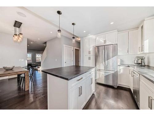 2120 Reunion Square Nw, Airdrie, AB - Indoor Photo Showing Kitchen With Upgraded Kitchen