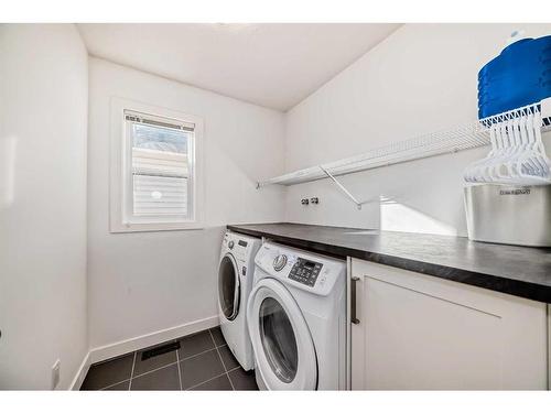 2120 Reunion Square Nw, Airdrie, AB - Indoor Photo Showing Laundry Room