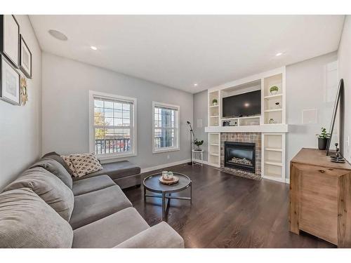 2120 Reunion Square Nw, Airdrie, AB - Indoor Photo Showing Living Room With Fireplace