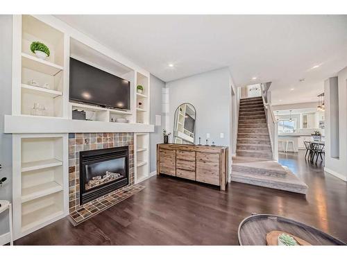 2120 Reunion Square Nw, Airdrie, AB - Indoor Photo Showing Living Room With Fireplace